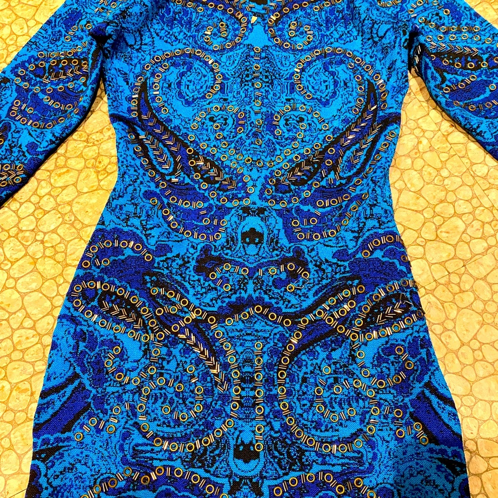 Bandage dress with metal rings